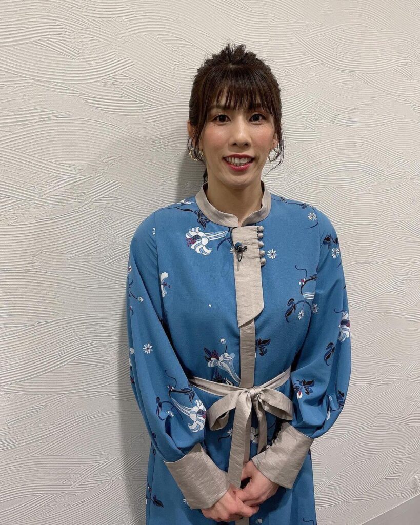 水色のワンピースを着た吉田さん